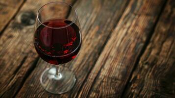 ai gegenereerd rood wijn in de glas in donker hout achtergrond met veenbessen foto