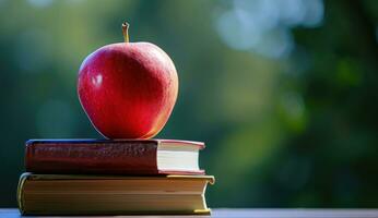 ai gegenereerd een appel Aan top van een stack van boeken met blauw lucht foto