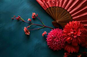 ai gegenereerd Chinese rood papier ventilator met bloem decoratie tegen blauw achtergrond foto