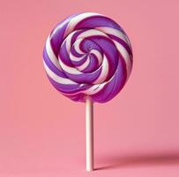 ai gegenereerd een Purper lolly in een roze achtergrond foto