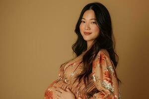 ai gegenereerd portret van mooi Aziatisch jong zwanger vrouw aanraken buik staand Aan kleur achtergrond foto