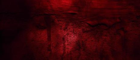 enge rode en zwarte horror achtergrond. donker grunge rood beton foto
