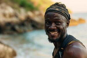 ai gegenereerd portret van gelukkig Afrikaanse Amerikaans Mens glimlachen en op zoek Bij camera terwijl staand Aan strand Bij sunse foto