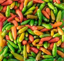 heet chilis ingrediënt voedsel kleurrijk achtergrond foto