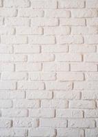 een witte bakstenen muur achtergrond verticale oriëntatie