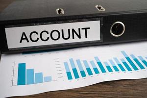 rekening, boekhouding. binder data finance rapport business met grafiekanalyse op kantoor. foto