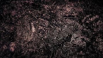 donkere textuurachtergrond van oud cementbeton foto