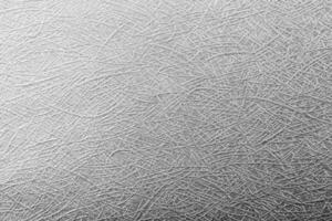 grijs zilver papier folie Aan achtergrond textuur. foto