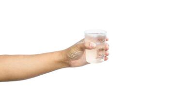 hand- Holding een glas van water foto