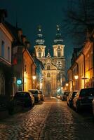 ai gegenereerd beeld van prachtig verlichte barok stijl kerk, genesteld tussen klassiek bouwkundig gebouwen Aan geplaveide straat Bij nacht ai gegenereerd foto