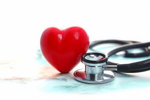 ai gegenereerd rood hart met stethoscoop, hart Gezondheid, Gezondheid verzekering concept, wereld hart dag, wereld Gezondheid dag, wereld hypertensie dag foto