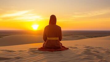 ai gegenereerd een vrouw in een rood gewaad zit Aan de zand en looks Bij de zonsondergang. foto