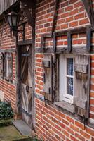 oud huis en kerk in Westfalen foto