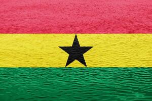vlag van republiek van Ghana Aan een getextureerde achtergrond. concept collage. foto