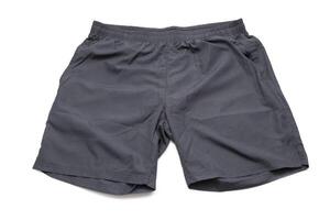 zwart sport- shorts geïsoleerd met wit achtergrond. concept van comfortabel kleding. foto