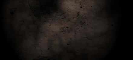 grunge enge achtergrond. oud zwart muurbeton. horror cement textuur foto