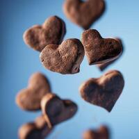 ai gegenereerd chocola koekjes in de vorm van harten vliegend tegen een blauw achtergrond foto