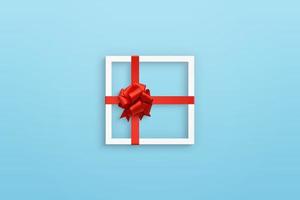 kerstframe als een cadeauconcept op pastelblauwe achtergrond foto