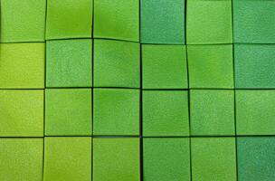 plein licht groen plastic muur. 3d groen textuur. foto