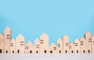 miniatuur huis voor eigendom investering, huis hypotheek, echt landgoed concept foto