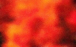 korrelig rood, oranje, en zwart kleuren helling achtergrond met lawaai of grunge structuur effect. abstract donker korrelig kleur verloop. grunge structuur achtergrond. korrelig donker achtergrond. kopiëren ruimte. foto