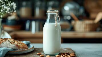 ai gegenereerd biologisch amandel melk in glas fles in de buurt keramisch kom met rauw amandelen Aan steen tafel in de keuken klaar voor Koken foto