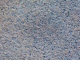 textuur, patroon, blauw tapijt achtergrond of voet schraper foto