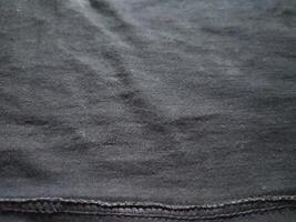 zwart kleding stof achtergrond patroon structuur foto