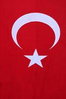 rood Turks vlag met halve maan en ster foto