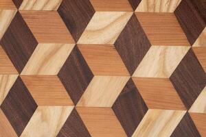 blokken van eik hout gebrandschilderd en gelijmd naar creëren een meetkundig patroon foto