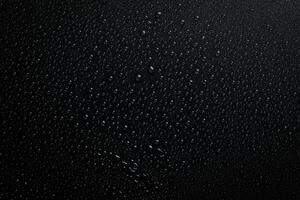 water druppels Aan zwart achtergrond. macro. zwart spandoek. foto