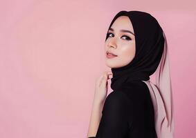 ai gegenereerd mooi hijab dragen vrouw in een portret presentatie van een blanco roze kleur foto studio concept met elegantie