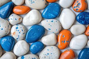 ai gegenereerd wit, blauw en oranje kiezels. kleurrijk stenen achtergrond. generatief ai foto