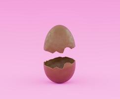 chocola ei geopend in twee helften Aan een roze achtergrond foto