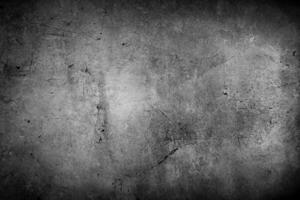 donker zwart getextureerde grunge beton muur achtergrond foto