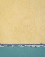 abstract papier landschap in geel en blauw pastel tonen - verzameling van kunst papieren foto