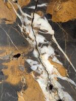 zwart marmeren met aderen. zwart marmeren textuur. marmeren achtergrond foto