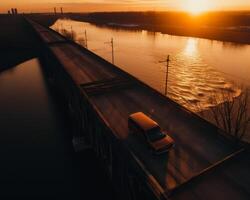 ai gegenereerd geel vrachtauto schijven Aan brug Bij zonsondergang foto