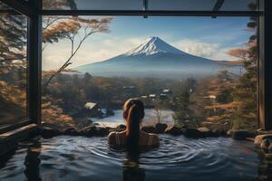 ai gegenereerd achterzijde visie van vrouw genieten onsen in de ochtend- Bij hotel en zien visie van fuji berg in Japan foto