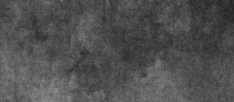zwart steen of beton muur of marmeren of gips textuur, donker kleur cement verdieping of beton textuur, kunst gestileerde structuur banier of Hoes of kaart, grunge structuur donker grijs houtskool schoolbord. foto