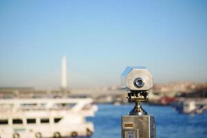 muntautomaat kijker op zoek uit over- stad , foto