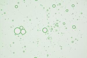 transparant groen gel textuur. structuur van olie serum met bubbels. hydraterend schoonheid Product voor huidverzorging. lotion voor lichaam zorg. foto