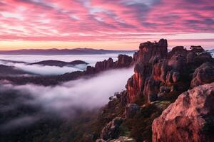 ai gegenereerd hoog rotsen in roze wolken en mist. mooi landschap van berg pieken. gegenereerd door kunstmatig intelligentie- foto