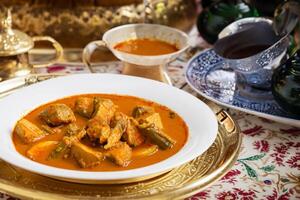 genieten de voortreffelijk lam of rundvlees kerrie rendang, klaar naar worden genoten Aan eid al-adha, vastleggen de essence van viering in een perfect foto, presentatie van culinaire meesterschap en feestelijk toegeeflijkheid foto