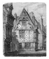 houten huizen van Normandië, wijnoogst gravure. foto