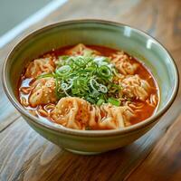 ai gegenereerd Kimchi noodle soep met knoedels in een licht groen kom Aan een houten tafel foto