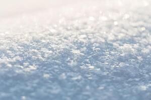 verbazingwekkend wit sneeuw structuur Aan een zonnig dag, macro foto