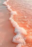 ai gegenereerd een roze strand met golven en water foto