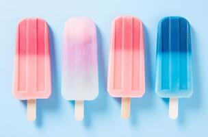 ai gegenereerd pastel zoet ijs lollies zijn Aan een roze en blauw achtergrond foto