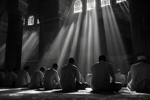 ai gegenereerd silhouetten van mensen bidden in een moskee met stralen van licht foto